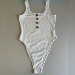 SHEIN white ribbed bodysuit with tortoise shell button accents